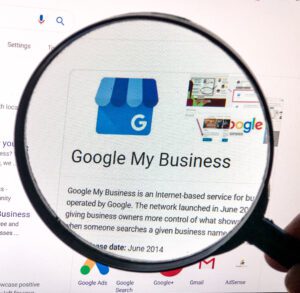 Google My Business on screen via Shutterstock